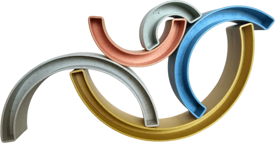 Colorful interlocking 3D rings with metallic texture on a beige background.